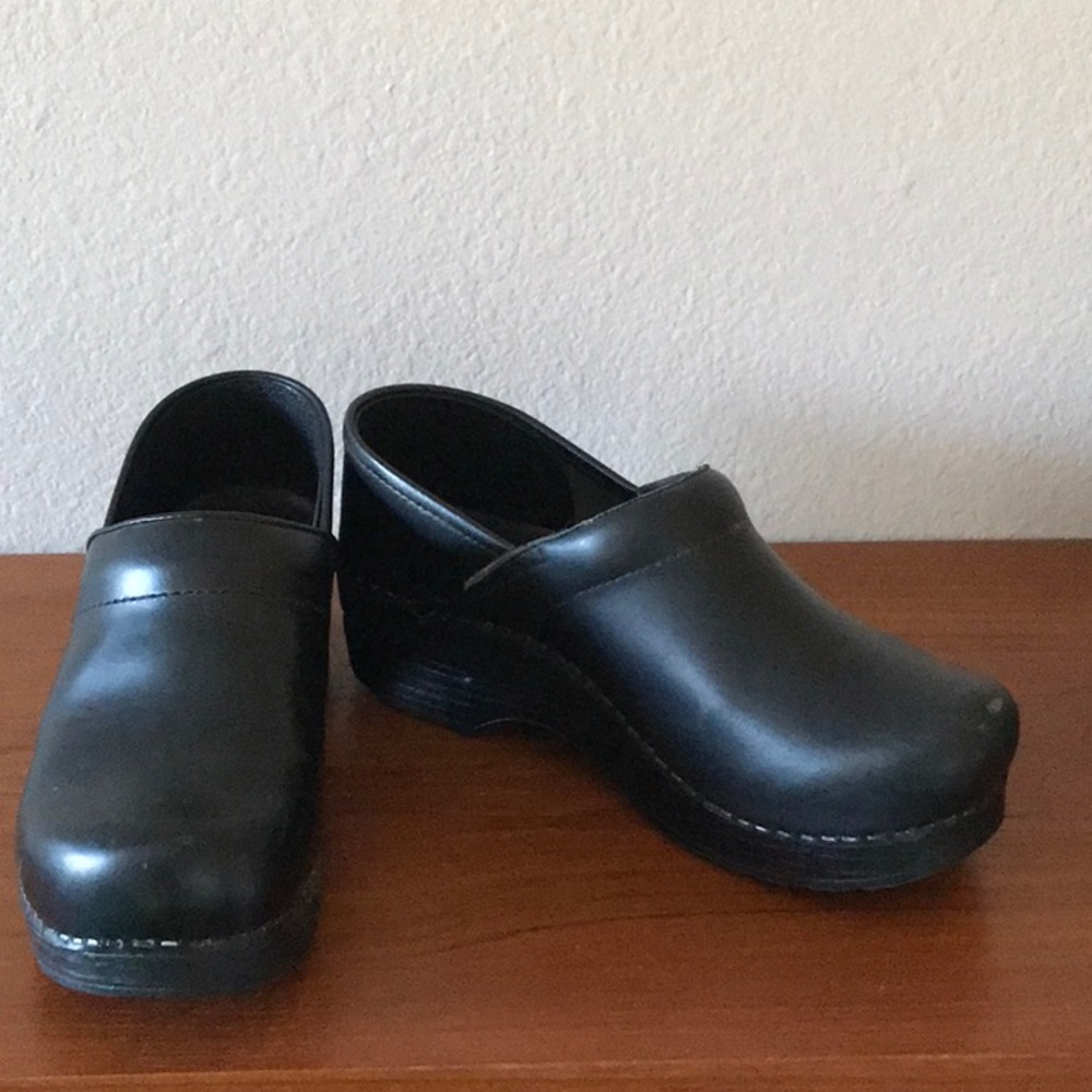 Black leather Dansko Clogs